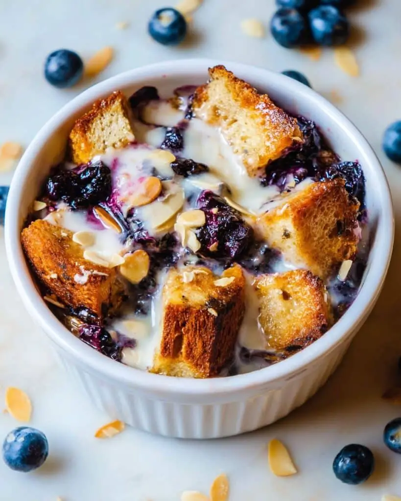 Blueberry Bread Pudding With White Chocolate Sauce