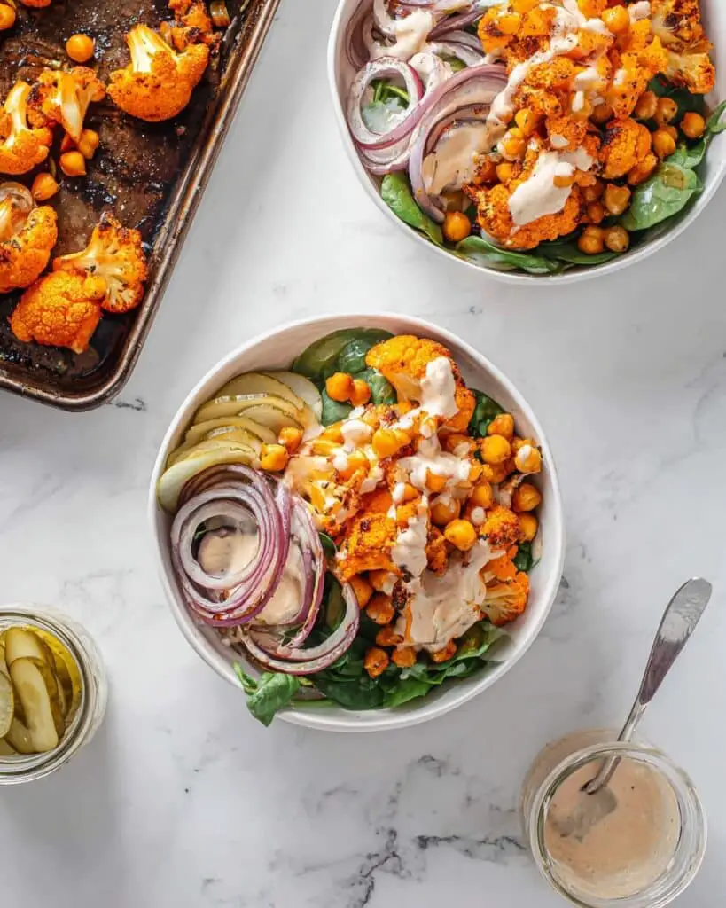 Harissa Roasted Cauliflower and Chickpeas with Tahini Sauce