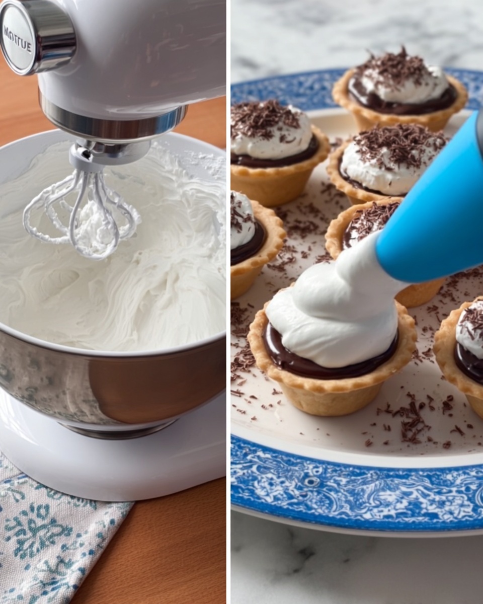 The image shows two side-by-side close-ups: on the left, a white mixing bowl with whipped white cream being whipped inside by a silver stand mixer on a wooden surface; on the right, a white plate with a blue rim holding small tart shells filled with a dark chocolate layer, and a woman's hand holding a blue piping bag is adding a smooth white dollop on top of one tart; some grated chocolate is sprinkled around the tarts on the plate, all set on a white marbled surface with a patterned cloth underneath. photo taken with an iphone --ar 4:5 --v 7