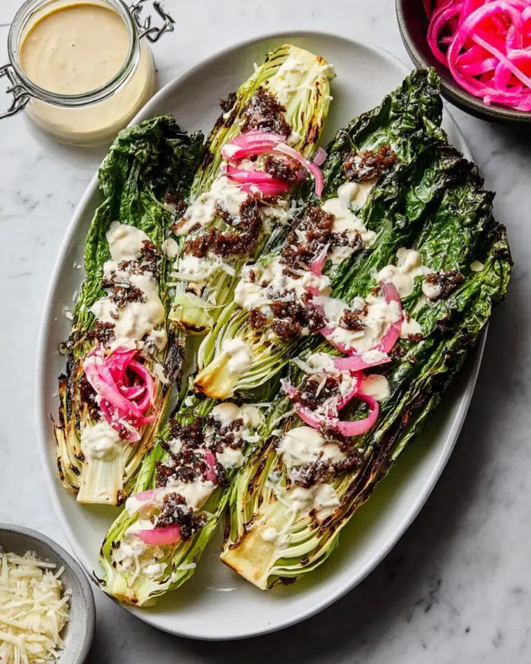 Grilled Romaine Caesar with Pickled Onions, Parmesan, and Homemade Croutons Recipe