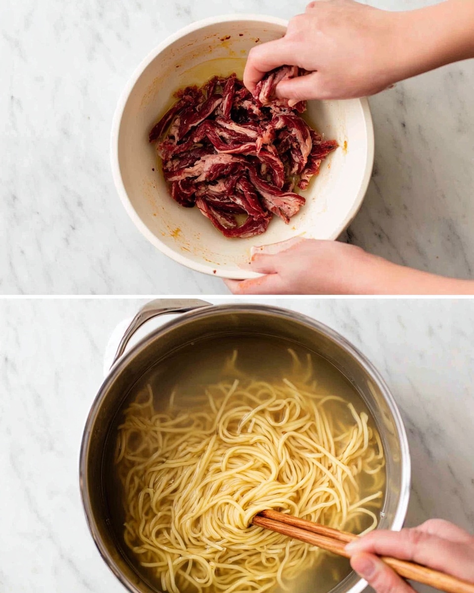 The top part of the image shows a pair of hands holding and mixing raw dark red meat strips in a white bowl with some light sauce residue inside, all placed on a white marbled surface. The bottom part shows a large metal pot filled with light yellow noodles submerged in clear water, with a pair of wooden chopsticks stirring the noodles, also on the same white marbled surface. photo taken with an iphone --ar 4:5 --v 7