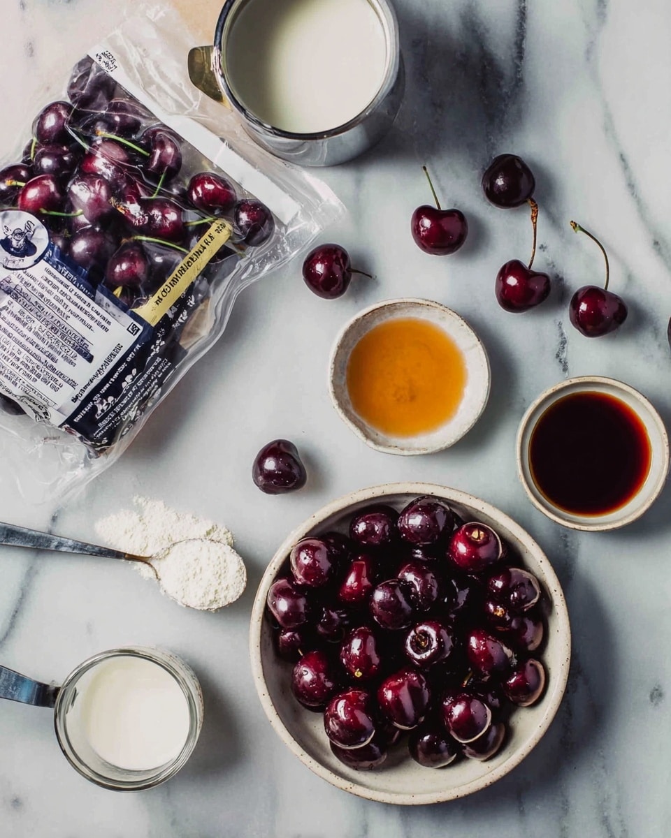 On a white marbled surface, there is a white bowl filled with dark red cherries, some cherries scattered nearby. Next to the bowl are two small white bowls containing amber and dark brown liquids. Above to the left, there is a quarter-filled silver cup with a white cream or milk inside. Near the bottom of the scene, there is a measuring cup filled with white cream or milk, and beside it lies a small spoon with a white powder. To the left, there is a clear plastic bag with cherries inside, labeled with text and pictures of dark cherries. photo taken with an iphone --ar 4:5 --v 7