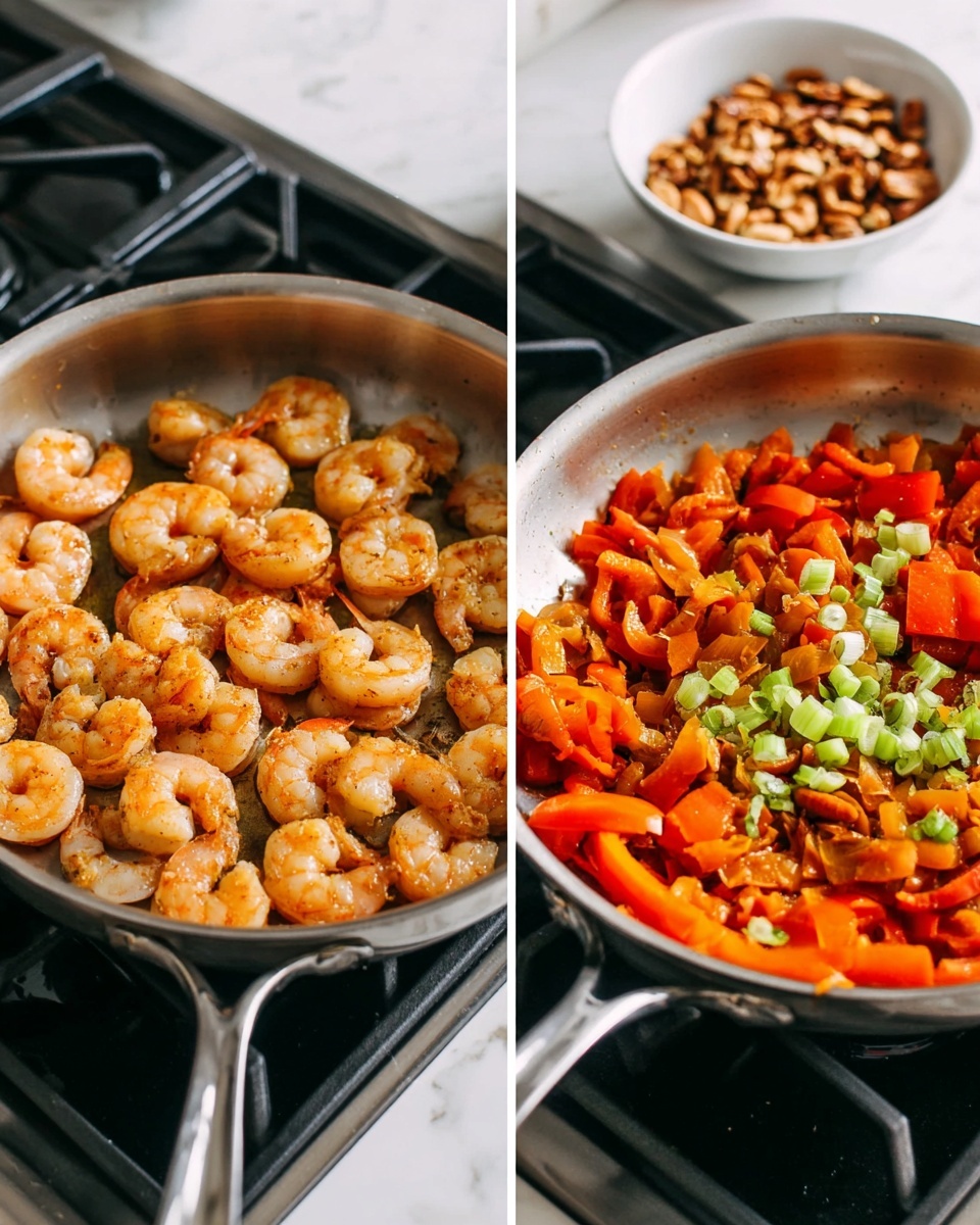 The image shows two stainless steel pans on a stove with a black surface; the background is a white marbled texture. The left pan contains a single layer of golden-orange cooked shrimp with tails on, arranged close together with a slight shine from cooking oil. The right pan holds a mix of sautéed vegetables in one layer: orange-red sliced bell peppers forming most of the base with small pieces of chopped green onions scattered on top. In the background, a white bowl filled with nuts is slightly blurred. Photo taken with an iphone --ar 4:5 --v 7