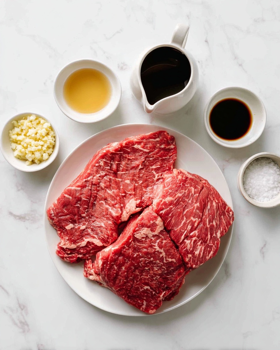 On a white plate placed on a white marbled surface, there are two large flat pieces of raw red meat with visible white marbling patterns evenly spread across them. Surrounding the plate are four small white bowls: one contains minced pale yellow garlic, one is filled with a golden liquid, another holds coarse white salt, and the last has a dark brown sauce. A small white cup with a white interior and slight spout is also filled with a similar dark brown liquid. The arrangement is neat and well spaced, with the bright colors of the ingredients contrasting against the clean white background. photo taken with an iphone --ar 4:5 --v 7