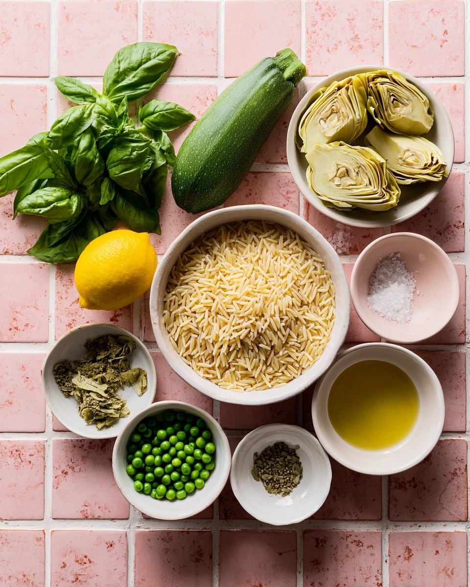 The image shows raw ingredients laid out on a white marbled surface with a pink tile pattern effect. On the left, there is a bunch of fresh green basil leaves and a whole lemon next to a dark green zucchini. In the middle, a white bowl is filled with dry orzo pasta, pale yellow in color. Below it, a smaller white bowl holds bright green peas. To the right of the peas, another white bowl contains light yellow artichoke hearts with some herbs. Surrounding these are three small white bowls: one with dried herbs and salt, one empty with a soft pink inside, and another holding light brown olive oil. photo taken with an iphone --ar 4:5 --v 7