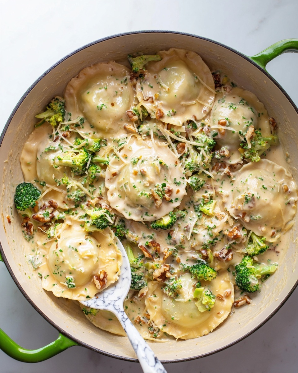 This image shows a gray pan on a white marbled surface filled with several large, light yellow ravioli pieces layered on top of a mix of bright green broccoli pieces and light brown cooked mushrooms. A white spoon is lifting one ravioli piece, revealing the soft texture of the pasta. The pan has green handles, and the colors of the ravioli, broccoli, and mushrooms contrast well with the gray pan and white marble background. photo taken with an iphone --ar 4:5 --v 7