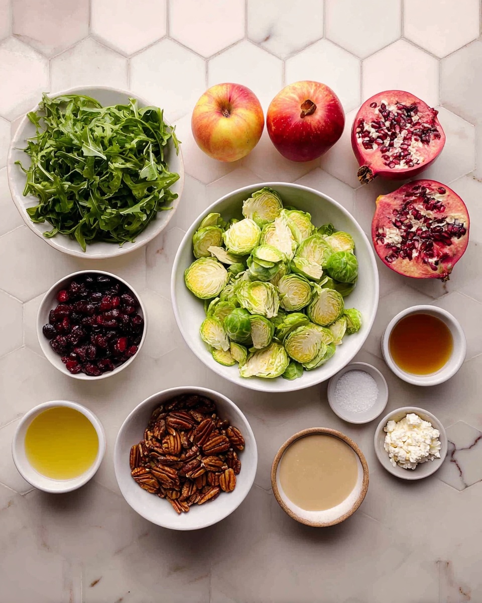 The image shows several white bowls arranged on a white marbled hexagon surface. The largest bowl in the center contains light green sliced Brussels sprouts with a rough texture. To its left, there is a white bowl full of dark green fresh arugula leaves. Below the arugula is a smaller white bowl with dark red dried cranberries, and next to that is a tiny white dish with white salt crystals. Above the arugula is a white bowl filled with chopped brown pecans. To the right of the Brussels sprouts are a few smaller white bowls: one has a pale yellow liquid, another has a darker amber liquid, another has a beige creamy paste, and one has white feta cheese crumbles. In the top left corner, there are three red and yellow apples placed directly on the white marbled surface. At the top right corner, there is a pomegranate piece showing dark red seeds covered with white pith. The scene is lit softly, emphasizing the fresh and natural colors of the ingredients. photo taken with an iphone --ar 4:5 --v 7