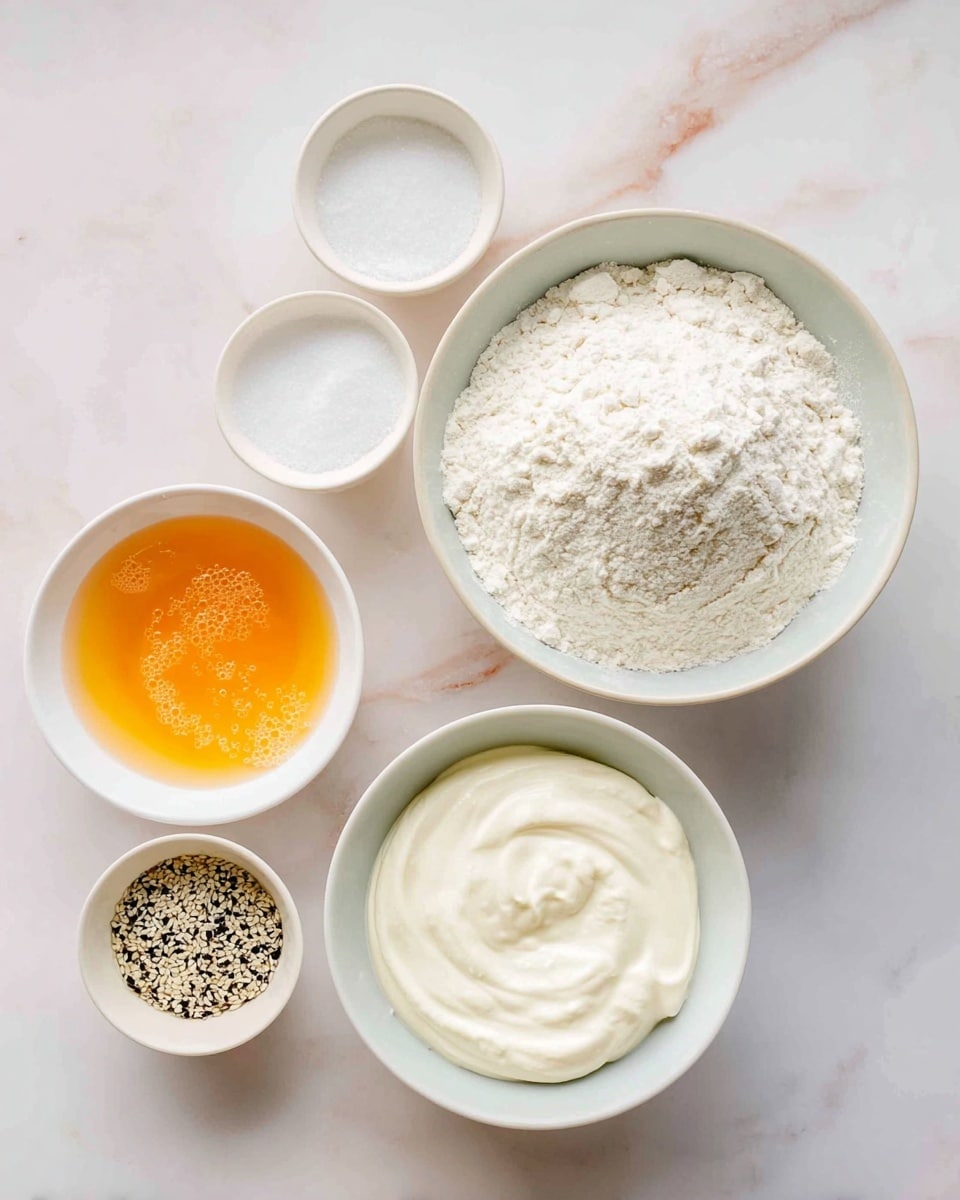 The image shows six white bowls on a white marbled surface. The largest bowl in the center contains white flour with a slightly uneven surface. To the right, a slightly smaller white bowl is filled with thick, creamy white yogurt, with smooth swirls on top. On the left side, a white bowl holds a raw beaten egg with an orange-yellow color and some bubbles on the surface. Another small white bowl nearby contains a mix of light and dark sesame seeds. Above the flour bowl are two small white bowls, one with white granulated sugar and the other with coarse salt. All bowls have simple, smooth textures. Photo taken with an iphone --ar 4:5 --v 7