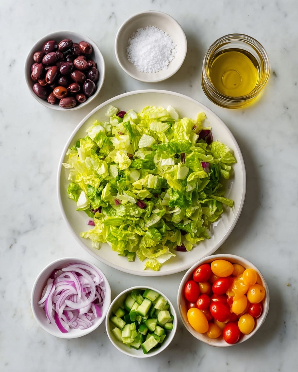 A white rectangular dish with black rim is filled with pink raw chicken pieces, showing layers of soft texture and a few white fat spots spread across the top, placed on a white marbled surface. To the top left of the dish, there is a small white bowl with grated yellow ginger on it, next to a halved lemon showing its bright yellow inside, and some green fresh herbs with thin leaves resting vertically. Below the dish, on the white marbled surface, there are three small white bowls, one containing thick white yogurt, another with a pale yellow liquid that looks like oil, and the smallest bowl holding some white salt. The photo taken with an iphone --ar 4:5 --v 7