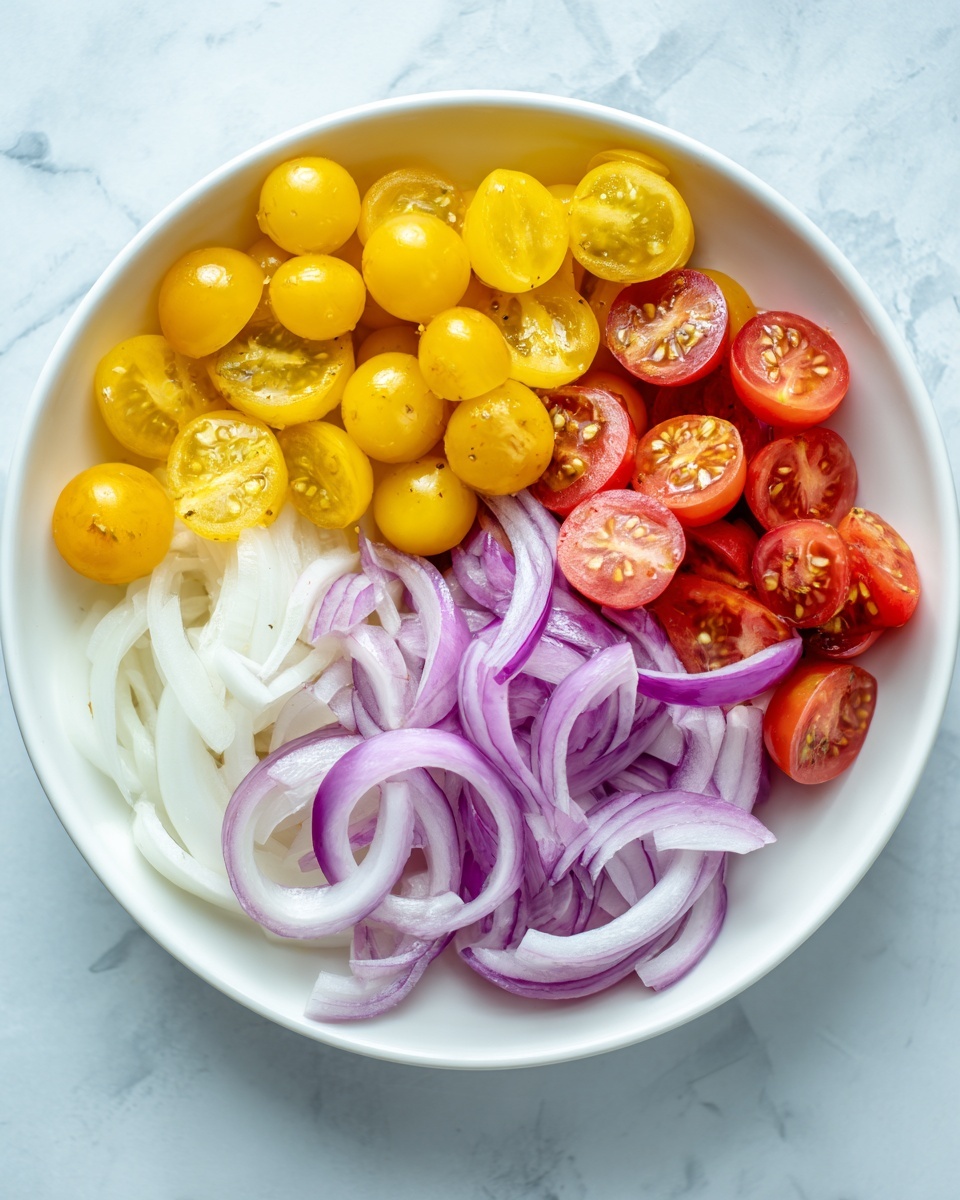 A white bowl is filled with four sections of sliced vegetables sitting on a white marbled surface. The top section has halved yellow cherry tomatoes with a smooth, shiny texture. The right section shows halved red cherry tomatoes, also shiny and fresh. The bottom section contains thinly sliced red onion rings, translucent with light purple edges. The left section is filled with thin white slices, smooth and slightly opaque, likely sliced parsnips or a similar root vegetable. The colors are bright, and each vegetable section is clearly separated. Photo taken with an iphone --ar 4:5 --v 7