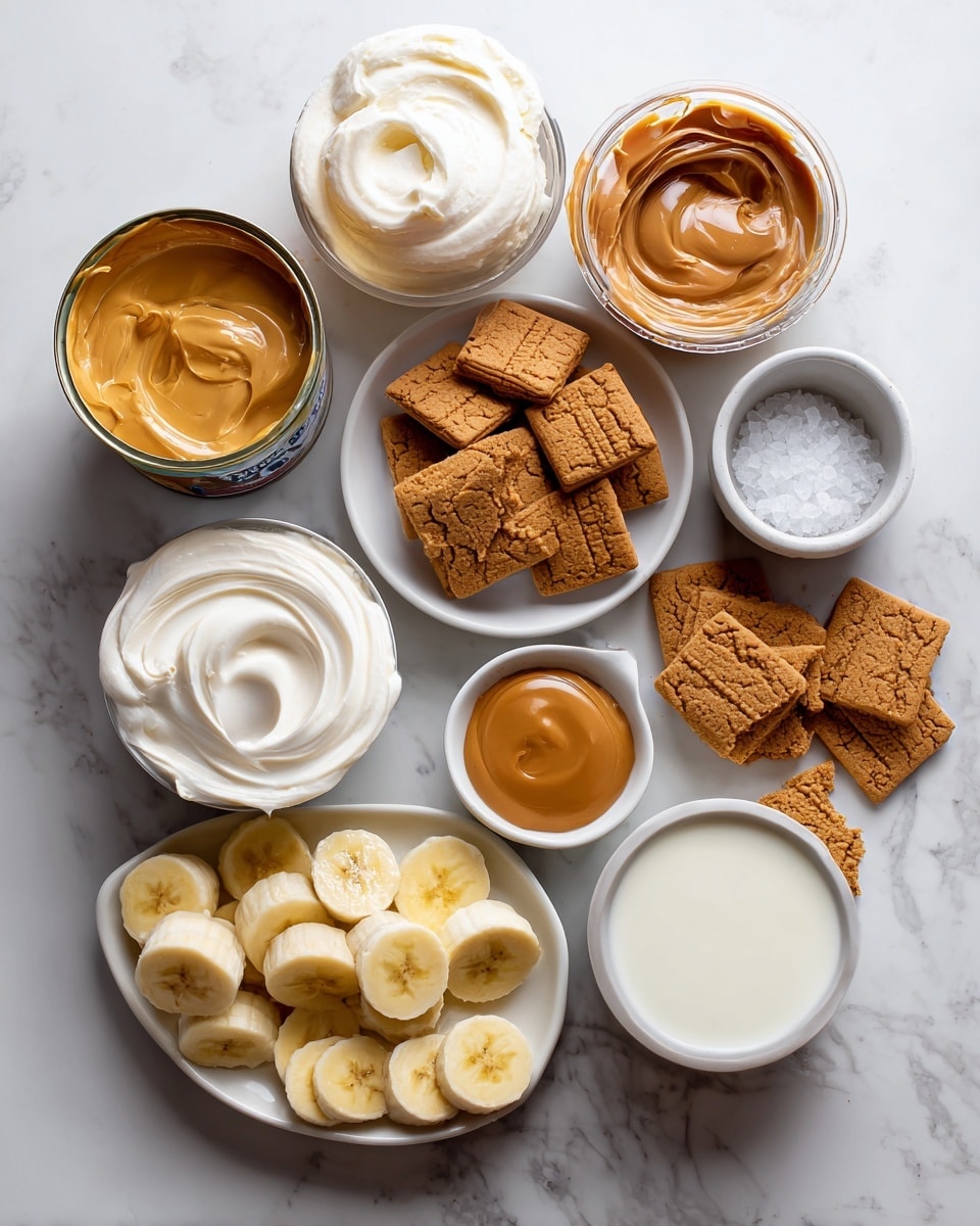 A white rectangular dish holds a layered dessert with a base creamy layer, topped with a thick layer of white whipped cream. On top, there are vertical rows of brown rectangular cookies, each partially inserted into the whipped cream, evenly spaced in the dish. Between the cookies, small round slices of banana are placed, showing soft yellow and cream colors. The dessert is finished with a drizzle of light brown sauce over the cookies and bananas. The dish is set on a white marbled surface with a soft, neutral fabric nearby. Photo taken with an iphone --ar 4:5 --v 7