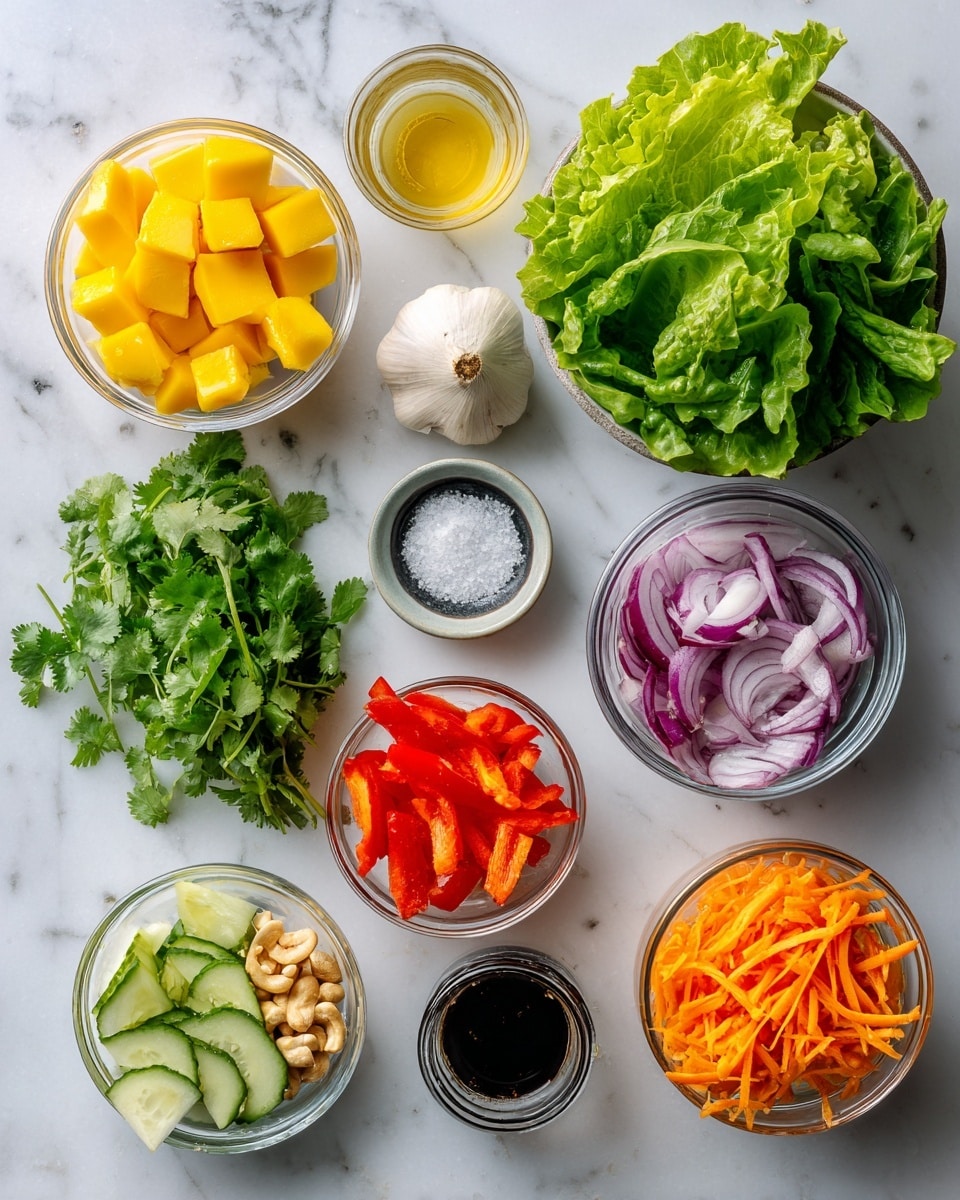 A large white bowl sits on a white marbled texture surface with a mix of fresh salad ingredients arranged in separate sections. Starting from the bottom left, there are green lettuce leaves with cucumber slices on top, each with smooth, pale green skin and a juicy texture. Next to the cucumber are bright yellow cubes of mango, followed by thin strips of purple and white onion. At the center, a small pile of chopped peanuts is surrounded by fresh green cilantro leaves. To the right, there are thin orange carrot strips and red bell pepper slices. All these layers are topped with a thick, bright yellow dressing drizzled unevenly across the salad. A silver spoon with a twisted handle rests inside the bowl. In the top left corner is a small glass jar filled with the same yellow dressing. photo taken with an iphone --ar 4:5 --v 7