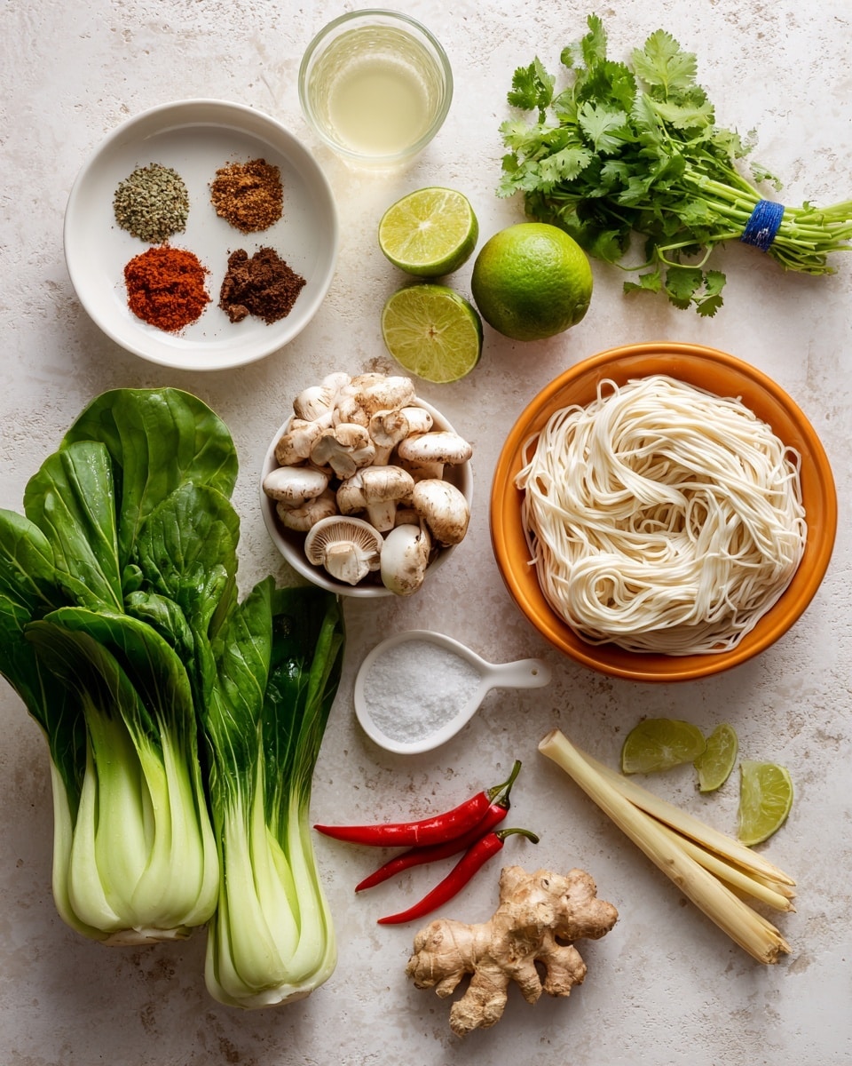 The image shows ingredients arranged neatly on a white marbled surface. There are three bowls: one white bowl with four small piles of different brown and beige spices, one orange bowl filled with white and brown mushrooms, and another orange bowl containing a tight square coil of thick white noodles. Surrounding the bowls are fresh green bok choy with leafy tops, bright green lime, clustered bunches of fresh cilantro tied with a blue band, three red chili peppers, a head of white garlic, a small piece of ginger, two pieces of lemongrass, a small pile of red chili powder, a small salt pile with coarse grains on a white spoon, and a glass filled with pale yellow liquid. The items are well spaced with vibrant natural colors against the light textured surface. photo taken with an iphone --ar 4:5 --v 7