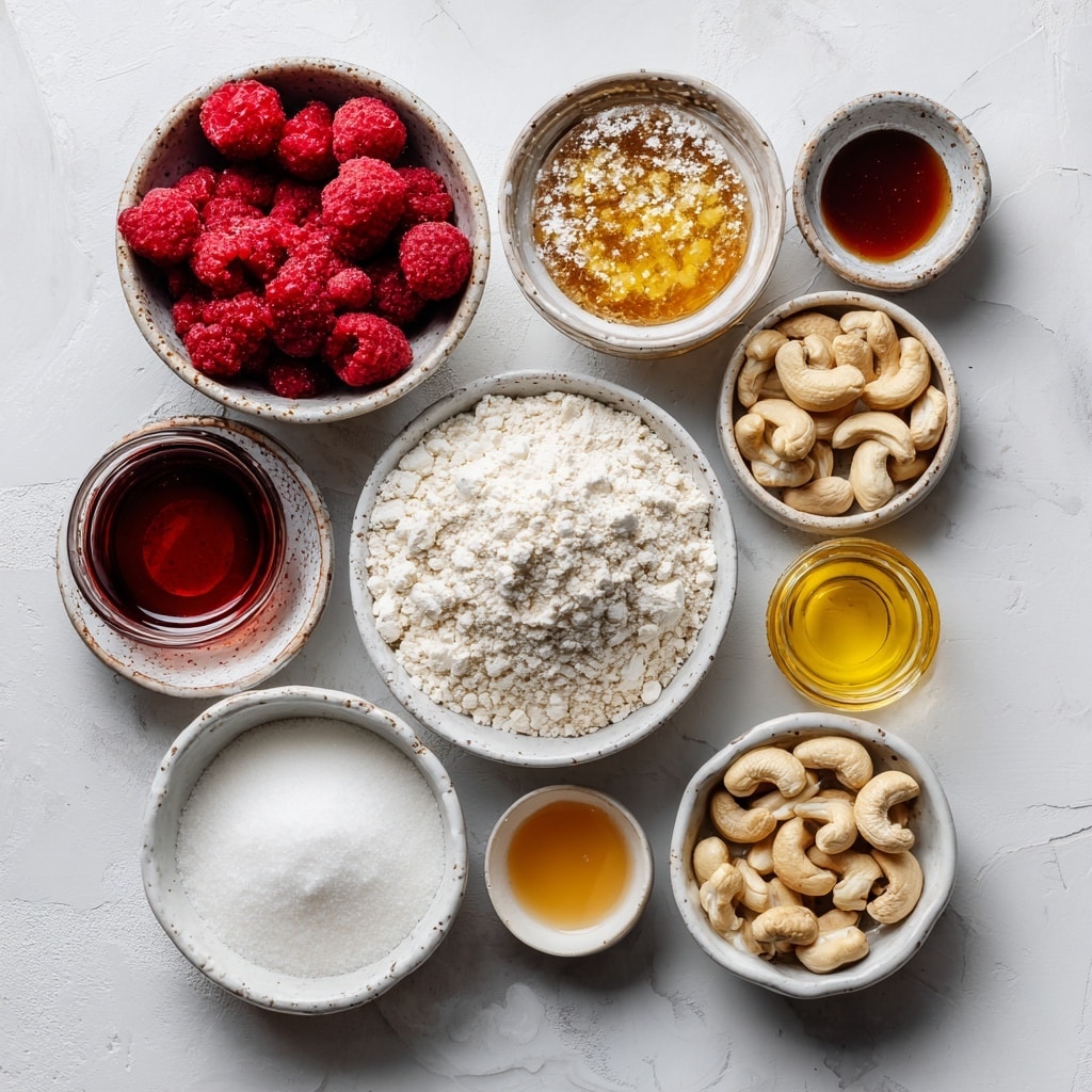 The image shows a close-up of two stages of making a bright red sauce. On the left, a white bowl holds a metal strainer filled with thick, chunky red pulp, with a woman's hand holding a silver spoon pressing the pulp against the strainer. The strainer rests over another white bowl that catches liquid. On the right, a smooth, shiny, bright red liquid with tiny bubbles is being stirred with a silver spoon inside a white bowl. The background surface under these bowls is white with a marbled texture. photo taken with an iphone --ar 4:5 --v 7