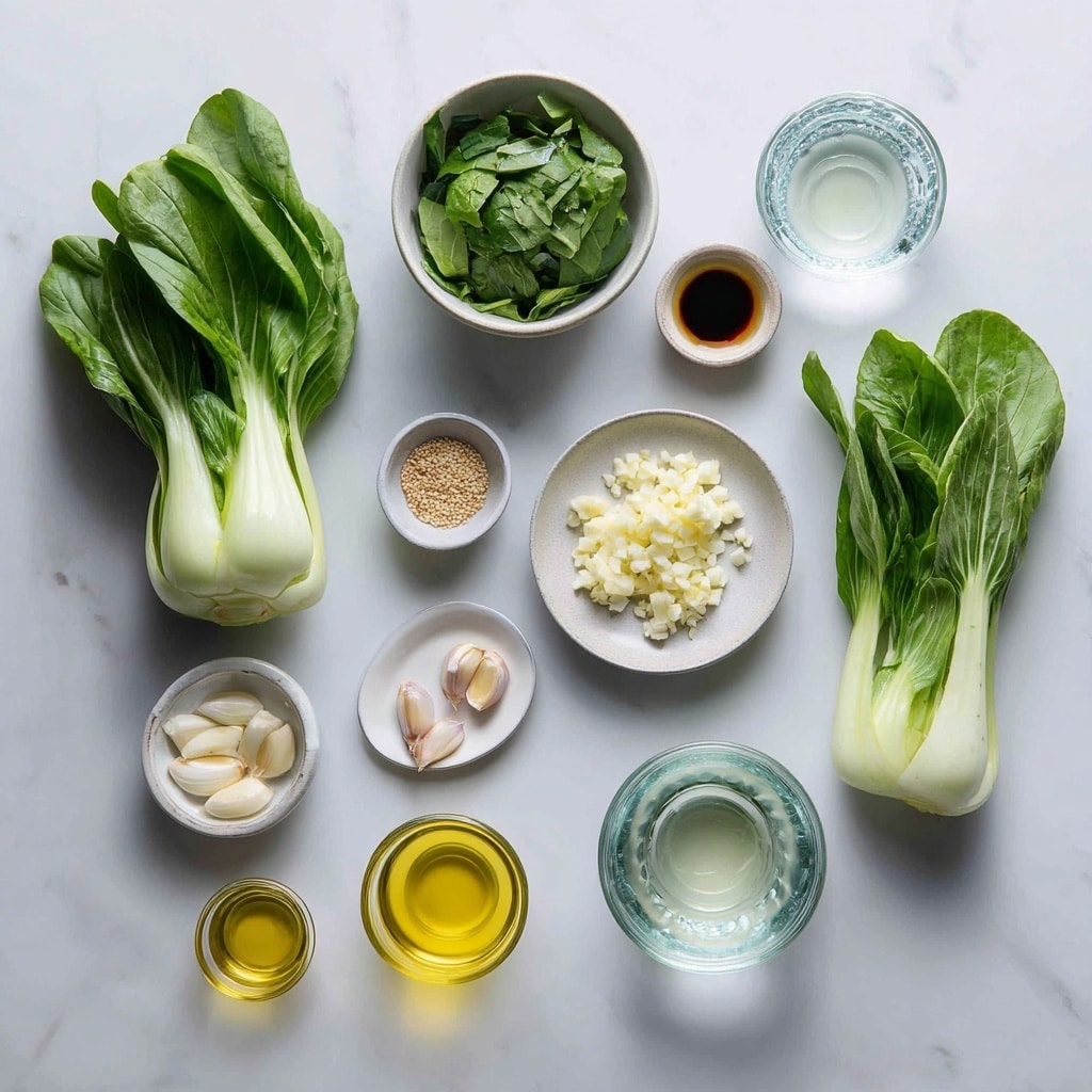 A black round plate with a thin brown edge holds three layered fresh bok choy pieces, each with white stems and dark green leaves that look soft and tender. Small golden brown crispy bits are sprinkled evenly across the bok choy, adding texture and color contrast. A pair of black chopsticks rests on the top edge of the plate. The plate sits on a light beige cloth, with a soft white marbled surface in the background and two white cups with black calligraphy behind it. photo taken with an iphone --ar 4:5 --v 7