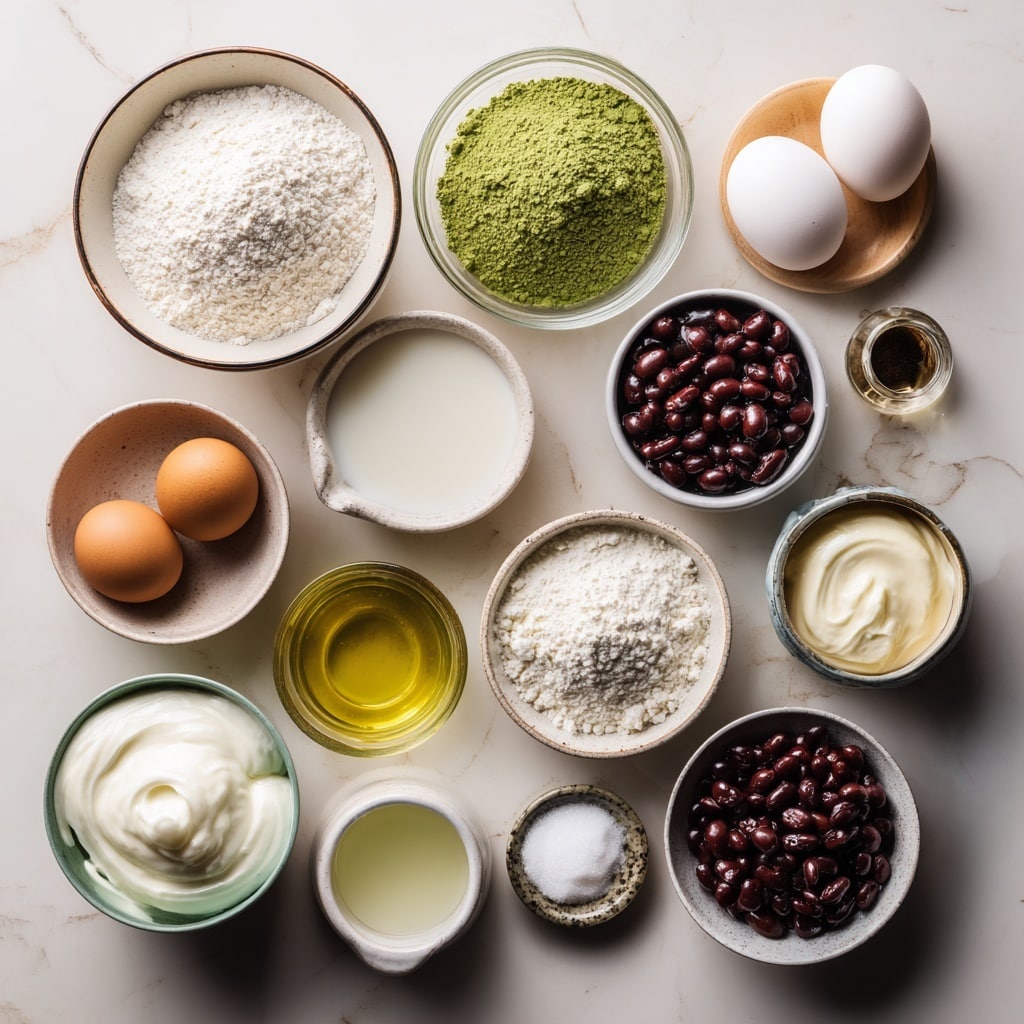 A transparent glass bowl filled with a smooth, light beige batter that has small dark specks, showing a thick and creamy texture. A pair of silver tongs is lifting a large round portion of the batter, stretching slightly as it drips back into the bowl. A woman's hand is holding the tongs gently from the left side of the image. The bowl sits on a white marbled surface, making the batter color stand out clearly. The batter fills about half the bowl, with some clinging to the top inside edges. photo taken with an iphone --ar 4:5 --v 7