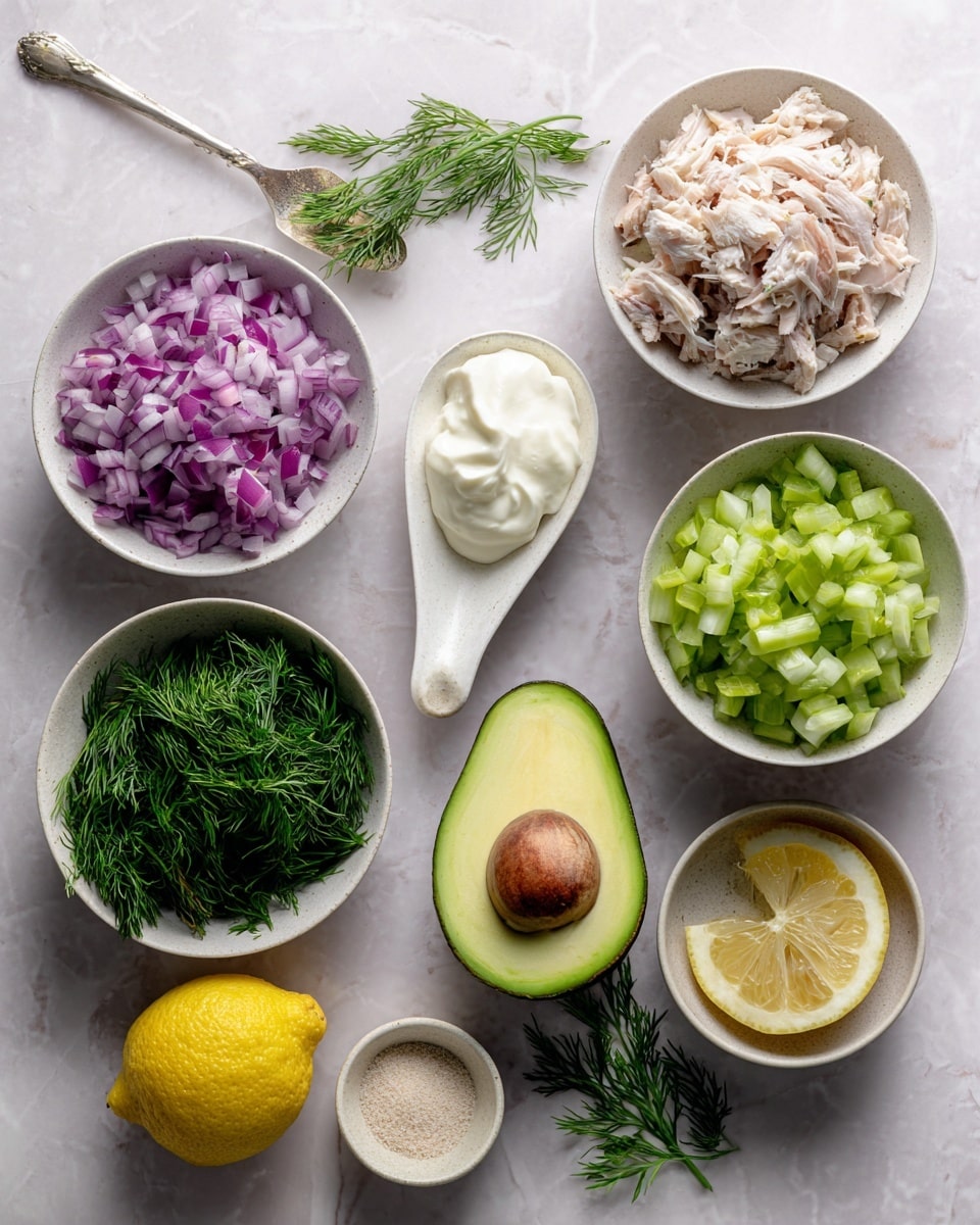 The image shows seven small white bowls arranged on a white marbled surface, each containing different ingredients. One bowl has finely chopped purple onion pieces, another holds small green celery cubes, and a third is filled with shredded light brown fish. A small spoon-shaped bowl contains a dollop of white creamy sauce, next to a halved avocado showing bright green flesh with a hollow center where the pit was removed. There’s a bowl with fresh, finely chopped dill that is dark green and feathery, a lemon half with bright yellow flesh and visible segments, and a very small bowl with a light beige powder. photo taken with an iphone --ar 4:5 --v 7