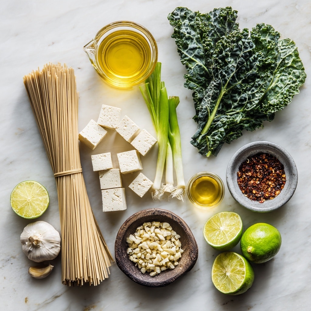 The image shows a four-step process of making a tofu noodle dish. The first part features many small white tofu cubes sprinkled with red chili flakes, spread out on a lined baking tray over a dark surface. The second shows the golden brown cooked tofu cubes still on the tray, alongside a white mortar with a pestle, and a white round plate that holds lime wedges, chopped green onions, garlic clove, and chili flakes, all set on a white marbled surface. The third and fourth parts show two ceramic bowls with layers of light brown noodles, dark green leafy vegetables, and golden tofu cubes on top, with forks placed inside each bowl; one image shows a close-up focusing on one bowl while the other captures both bowls alongside the white plate with garnishes and the mortar on a soft grey cloth. photo taken with an iphone --ar 4:5 --v 7