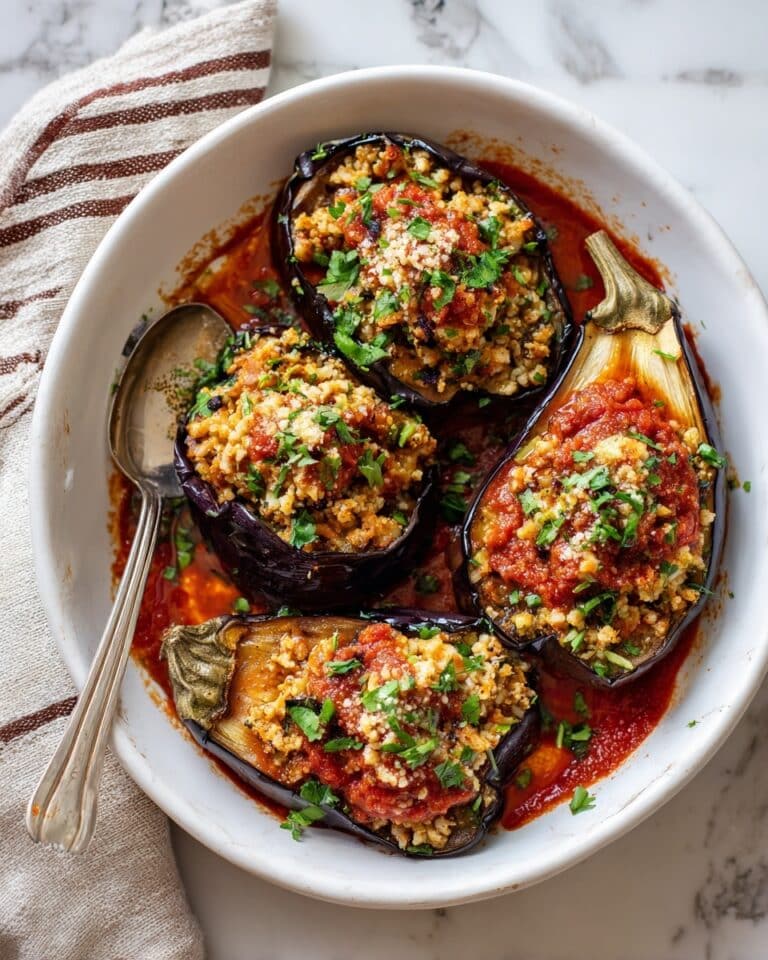 Stuffed Eggplant with Ground Beef, Rice, and Tomato Sauce Recipe