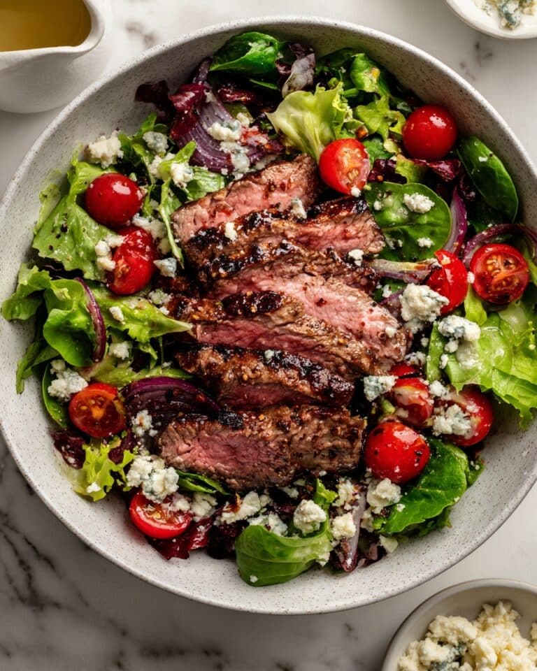 Steak Salad with Grilled Onion, Cherry Tomatoes, and Blue Cheese Recipe