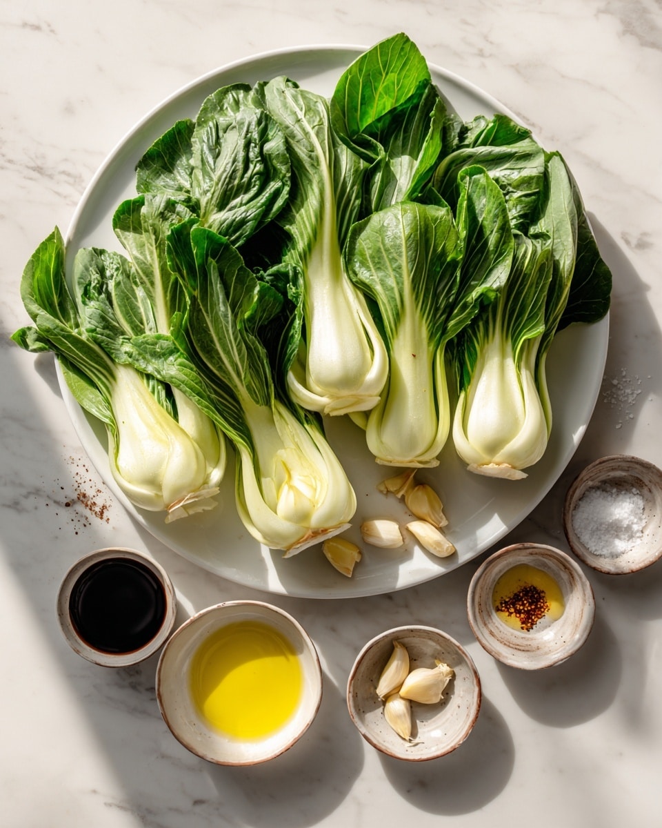 A large white plate filled with six fresh baby bok choy bunches, each showing bright white stalks and dark green leafy tops, arranged loosely to cover most of the plate. Around the plate are five small ceramic bowls on a white marbled surface, each containing different ingredients: one with dark soy sauce, one with two garlic cloves, one with a small pile of salt, one with yellow oil, and one with light brown liquid, all casting soft shadows in bright sunlight. The image captures a clean, fresh setup with natural lighting. photo taken with an iphone --ar 4:5 --v 7