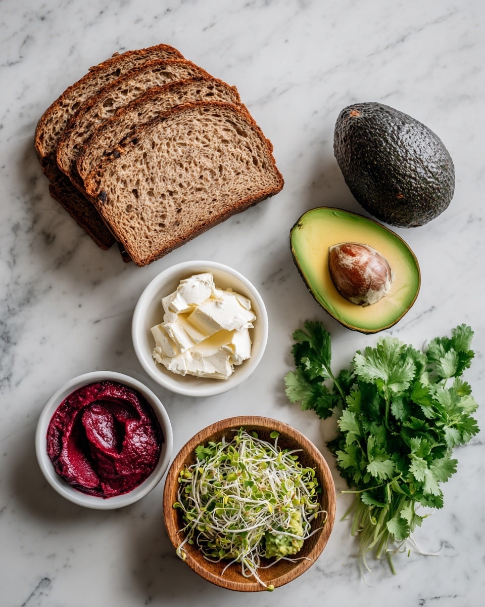The image shows four slices of brown bread stacked on the left side of a white marbled surface. To the right, two halves of an avocado are placed, one with a dark brown seed and the other hollowed out, next to a whole dark green avocado. Below the bread, there are three small white dishes: one with a creamy white cheese, one with a deep red beet spread, and a wooden bowl filled with light-colored sprouts. At the bottom right corner, there is a bunch of fresh bright green cilantro leaves. Photo taken with an iphone --ar 4:5 --v 7