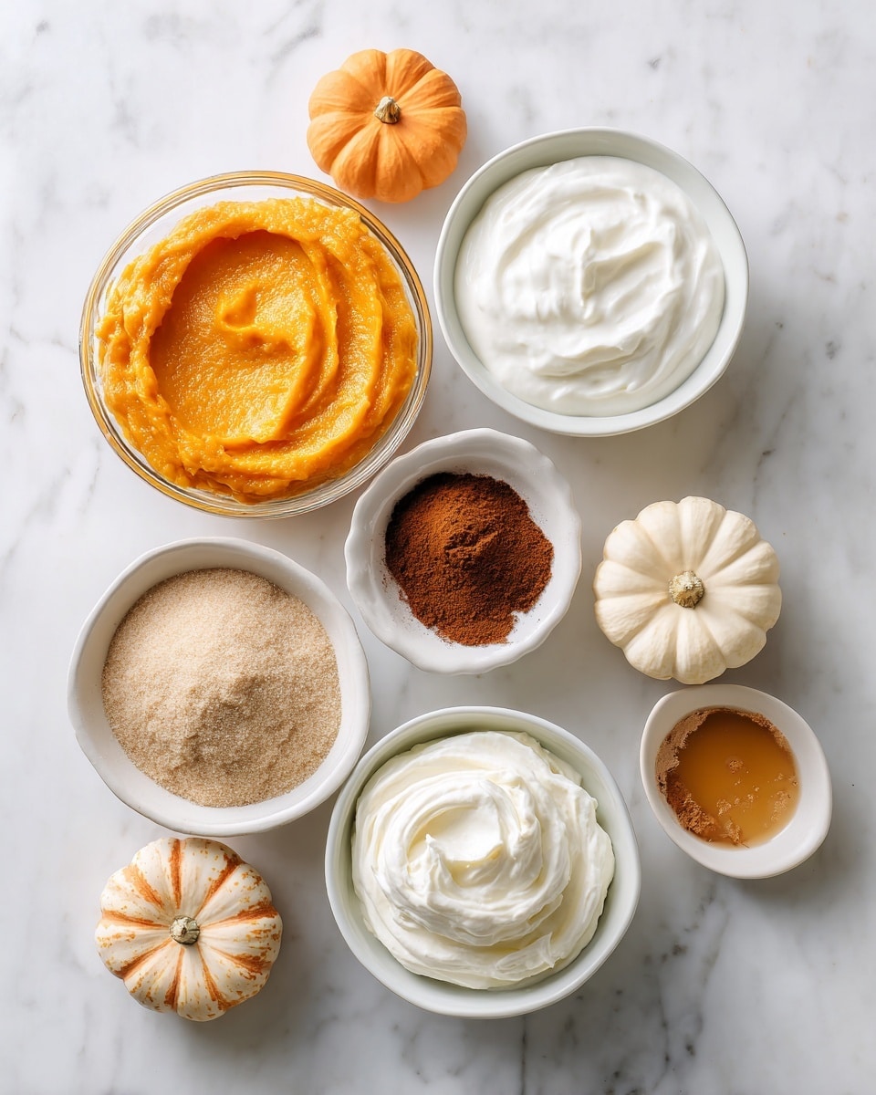 The image shows six small white bowls and a clear glass bowl on a white marbled surface, each filled with different ingredients. The clear glass bowl at the top left holds bright orange pumpkin puree with a smooth, thick texture. Directly to the right, a white bowl contains white cream with a soft and smooth surface. Below, a light beige bowl is filled with light brown sugar that has a loose, crumbly texture. Next to it on the right is a small white bowl with dark brown cinnamon powder, fine and smooth in texture. Below the sugar bowl is a tiny white bowl holding amber-colored vanilla extract that looks clear and shiny. At the bottom right, a large white bowl contains smooth, thick white cream cheese with a swirled top. Small decorative pumpkins in orange and pale peach are placed around the bowls on the white marbled surface, adding a fall theme. photo taken with an iphone --ar 4:5 --v 7
