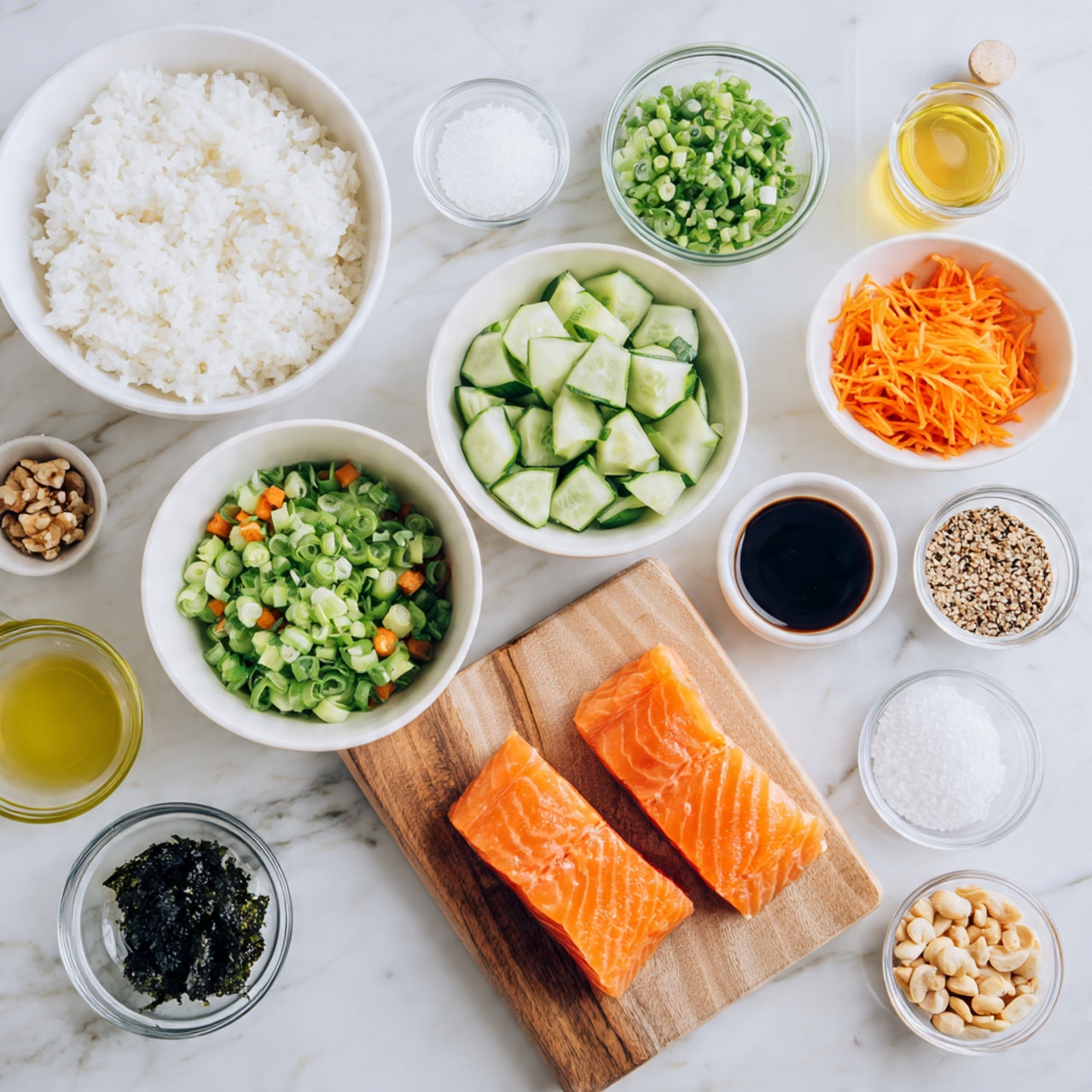 Several small clear and white bowls are placed on a white marbled surface, each holding different ingredients. One large white bowl is filled with white rice. Another large white bowl contains chopped green cucumbers, sliced green onions, and shredded orange carrots. A smaller clear bowl holds diced green avocado, placed on a wooden board next to raw salmon fillets which show a rich orange color with smooth texture. Around the bowls and board are tiny clear bowls with dark green seaweed, white powder, light brown crushed nuts, clear liquid, golden oil, and a small white dish with white and black seeds mixed. Two small glass containers hold yellow and dark brown sauces. The scene is bright and clean. photo taken with an iphone --ar 4:5 --v 7