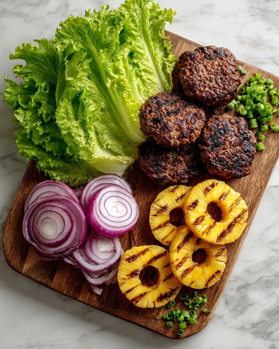 A wooden board on a white marbled surface holds a visually arranged dish with four main components: at the top left, bright green leafy lettuce with soft, wrinkled texture and ruffled edges; below it are four dark brown grilled beef patties with a slightly rough and uneven surface, showing grill marks; to the right of the patties, there are five circular grilled pineapple rings with charred edges and grill lines, bright yellow with a juicy texture; at the bottom left, several purple and white grilled red onion slices with visible grill marks and rings stacked slightly on each other; small chopped green scallions sprinkled near the top right corner complete the vibrant scene, photo taken with an iphone --ar 4:5 --v 7