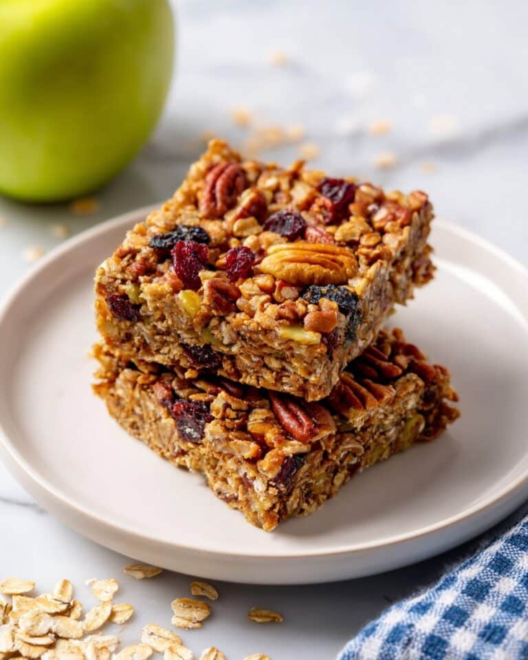 Baked Apple Oatmeal with Pecans, Cranberries, and Raisins Recipe