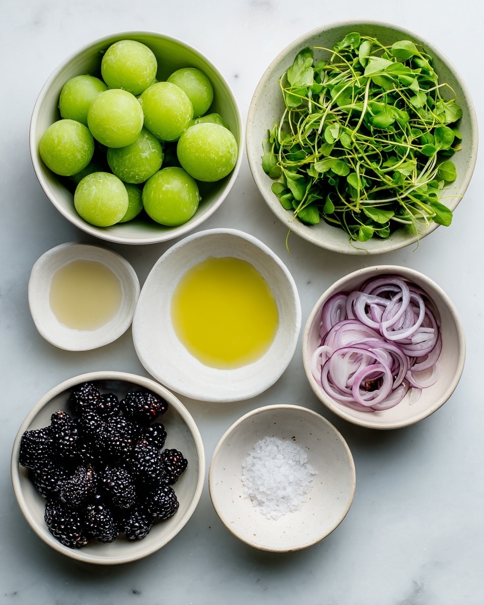 The image shows seven small white bowls arranged on a white marbled surface. The top left bowl is filled with bright green melon balls, smooth and round in shape. To the right of it is a bowl full of fresh, green leafy watercress with thin stems. Just above the watercress bowl, a small white bowl holds a light golden liquid. Below the melon balls, a bowl contains dark blackberries with textured, bumpy surfaces. To the lower right of the blackberries, another white bowl is filled with thinly sliced pale purple shallots, loosely coiled. Near these, a small bowl of olive oil with a rich golden hue sits, and beside it, a tiny bowl holds coarse white salt crystals. The setup is clean, bright, and fresh, with all the bowls evenly spaced. photo taken with an iphone --ar 4:5 --v 7