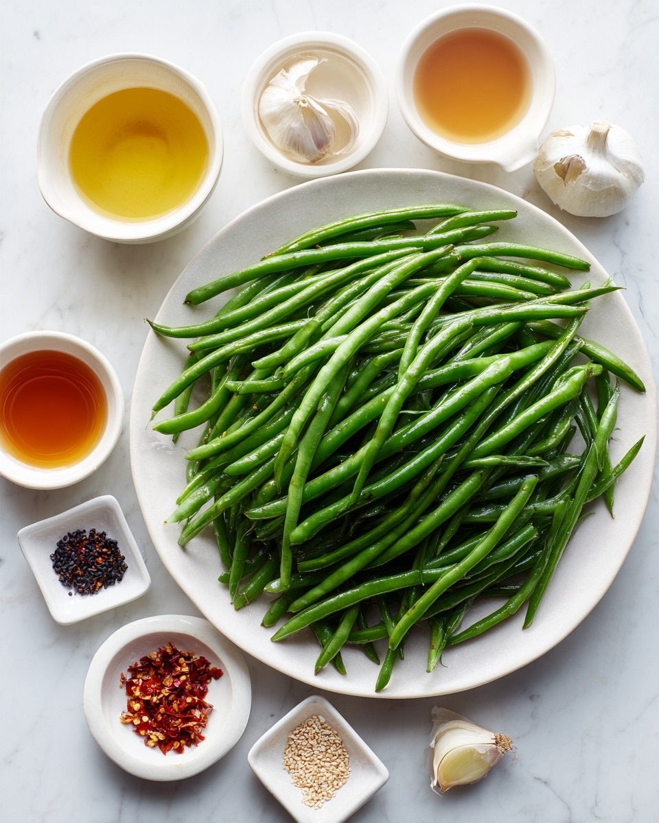 A large white plate filled with a piled stack of fresh, long green beans with a smooth texture. Around the plate, there are five small white bowls and dishes containing different ingredients: one round bowl with a golden-yellow liquid, another round bowl with a clear liquid, a third round bowl with a light brown liquid, a small dish with red chili flakes soaked in liquid, and a square white dish containing three small piles of coarse white salt, light brown sesame seeds, and black sesame seeds. There are also two garlic cloves placed near the dishes, all arranged on a white marbled surface. photo taken with an iphone --ar 4:5 --v 7