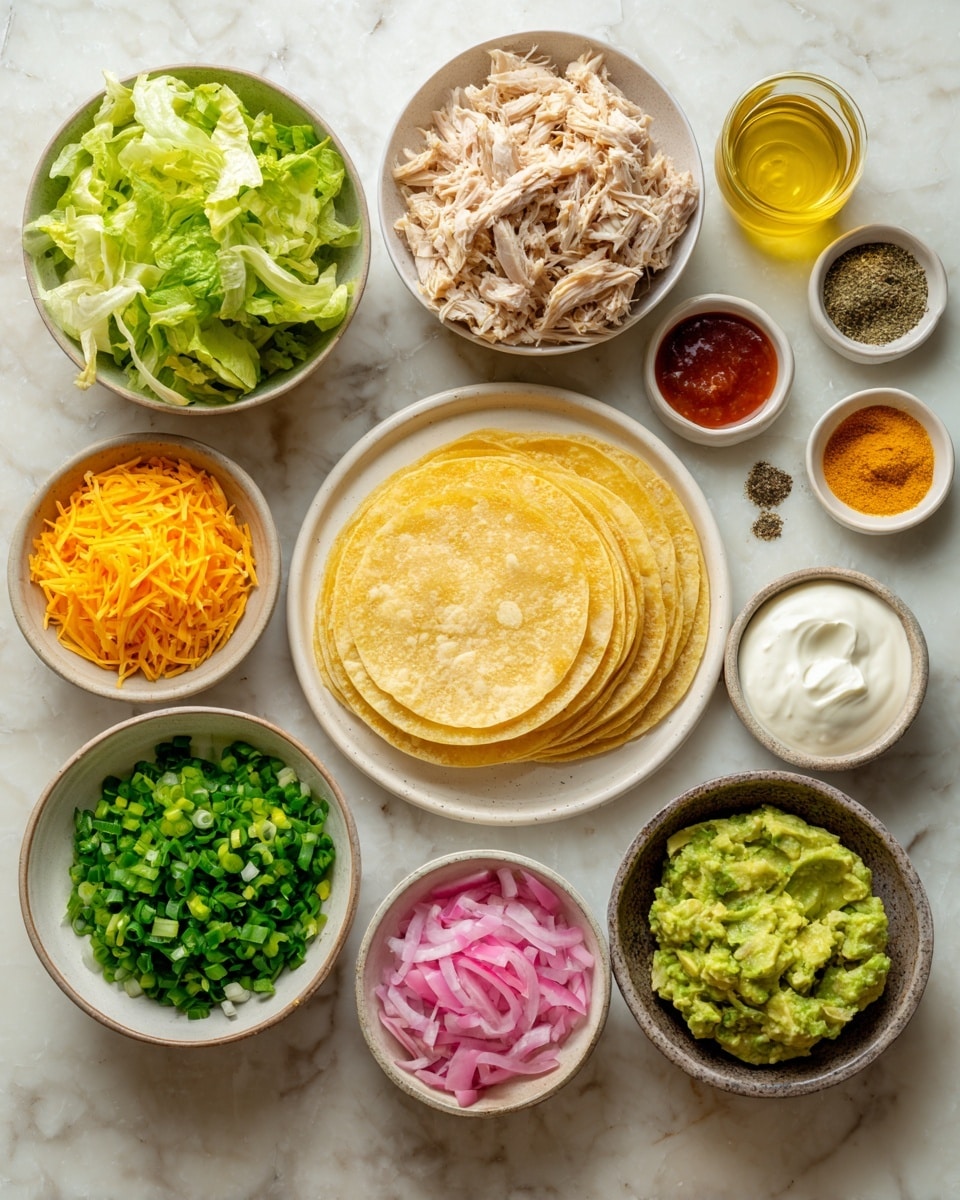 The image shows a collection of small bowls and a plate arranged on a surface with a white marbled texture. At the center, there is a stack of yellow corn tortillas on a white plate. Around it, there are several bowls: one with shredded cooked chicken that is light beige in color, another with shredded bright orange cheese, a bowl of chopped green lettuce, a bowl with fresh green chopped spring onions, and a bowl with mashed green avocado. There are also small bowls containing white sour cream, bright pink pickled onions, a reddish-orange sauce, a yellow oily liquid, a green creamy sauce, and small amounts of black pepper and a yellow powder. All these ingredients are neatly placed and ready to be used for making tacos or a similar dish. photo taken with an iphone --ar 4:5 --v 7