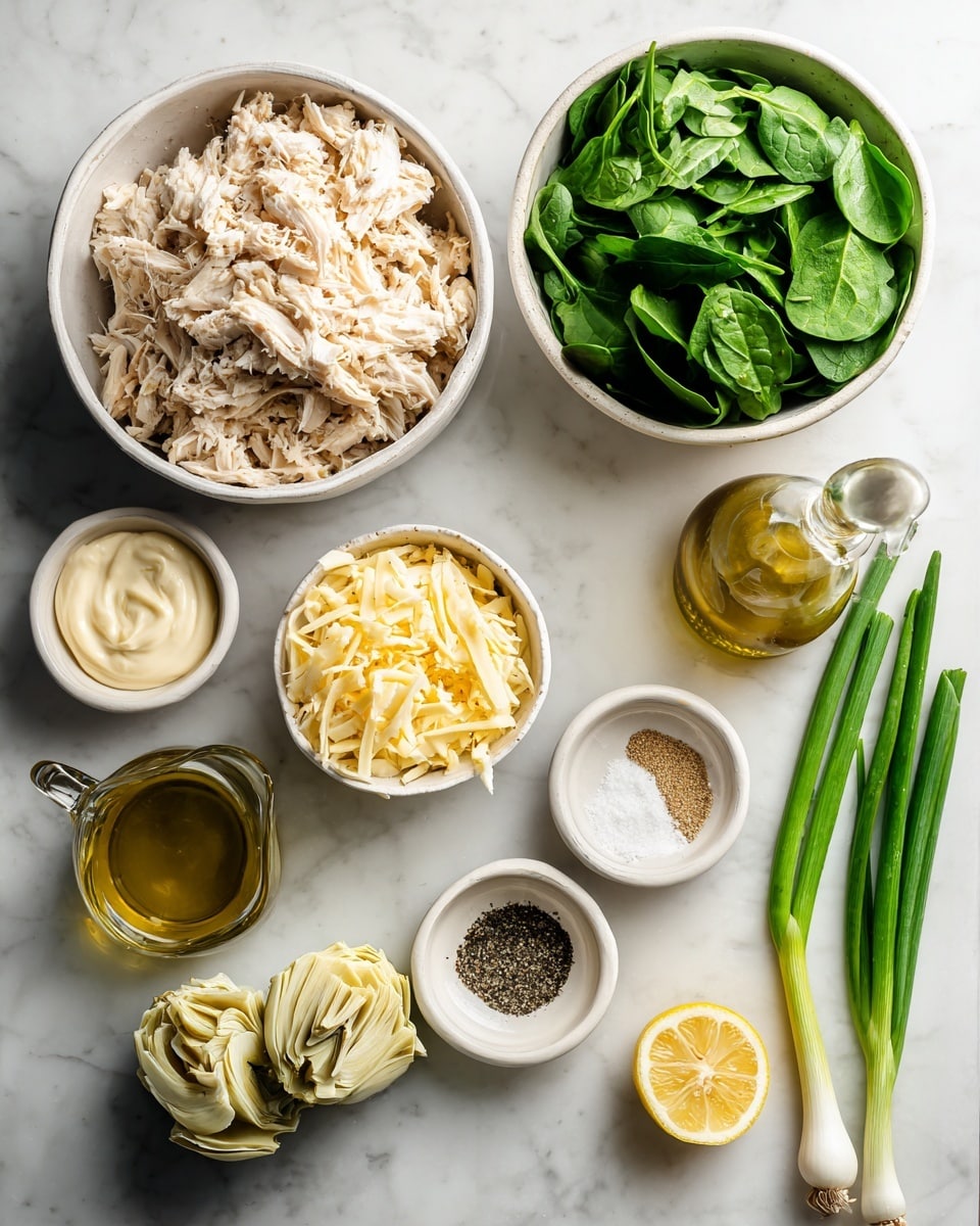The image shows several white bowls and small containers arranged on a white marbled surface. There is a bowl filled with shredded cooked chicken on the left, a bowl with crushed artichokes near the center, and a bowl full of fresh green spinach leaves on the right. Near these, smaller containers hold a yellowish shredded cheese, mayonnaise, a creamy white sauce, ground black pepper in a small white dish, and garlic powder in another small white dish. There is also a small glass bottle of olive oil, two halves of a lemon, and three green onions placed on the right side of the image. photo taken with an iphone --ar 4:5 --v 7