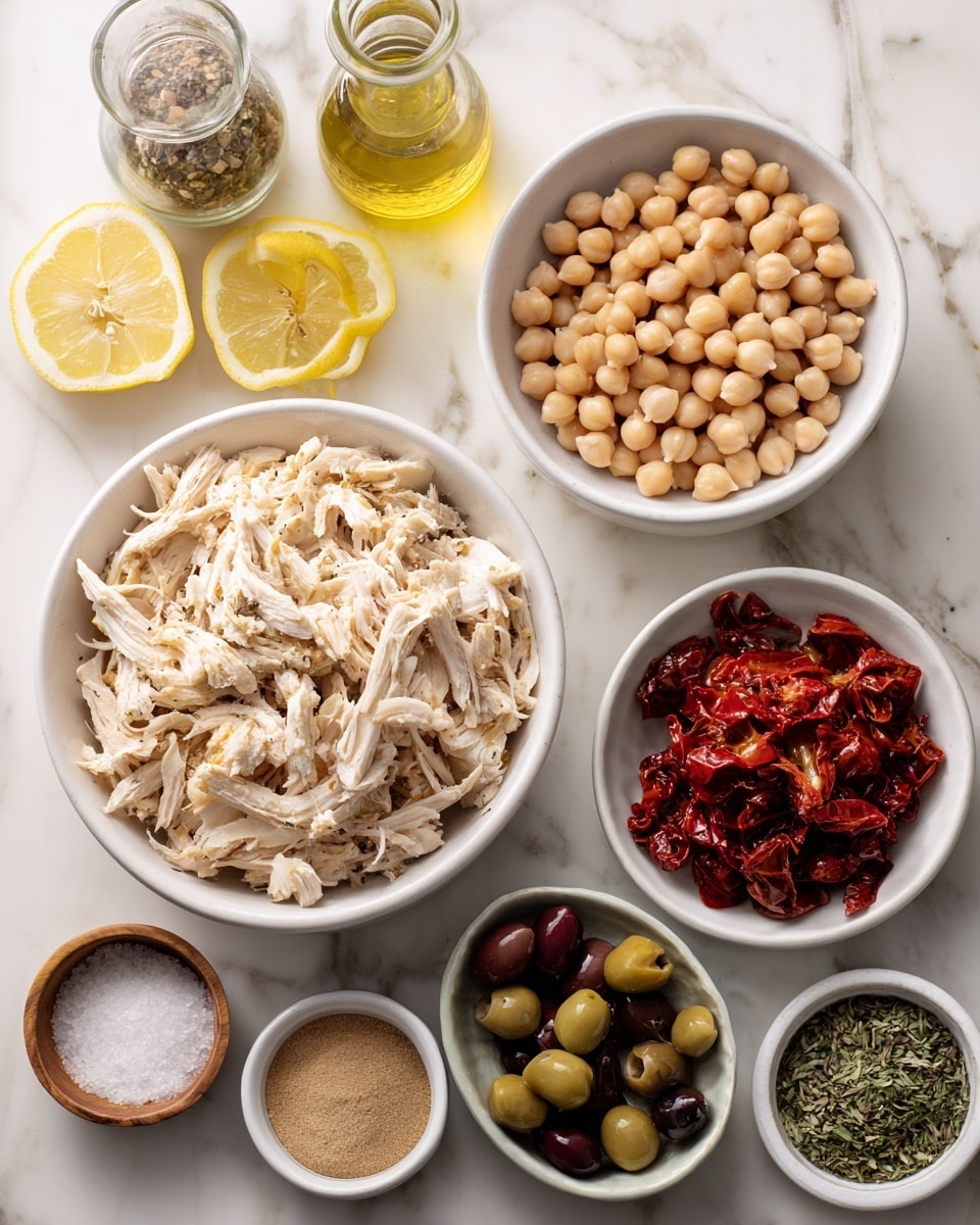 The image shows several white bowls placed on a white marbled surface, each containing different ingredients. In the bottom left, there is a large white bowl filled with shredded light beige chicken. Above that, a slightly smaller white bowl holds whole light tan chickpeas. To the right, there are four small white bowls: two with chopped vibrant red roasted bell peppers and a mix of green and black sliced olives, one with dark red sun-dried tomatoes, and one with dried green herbs. A small wooden bowl contains a light tan powder, and two other small white bowls hold salt and black pepper mix and ground beige spice. On the upper left, a white bowl has two lemon halves with lemon zest. Behind it, there is a clear glass bottle filled with golden olive oil. photo taken with an iphone --ar 4:5 --v 7