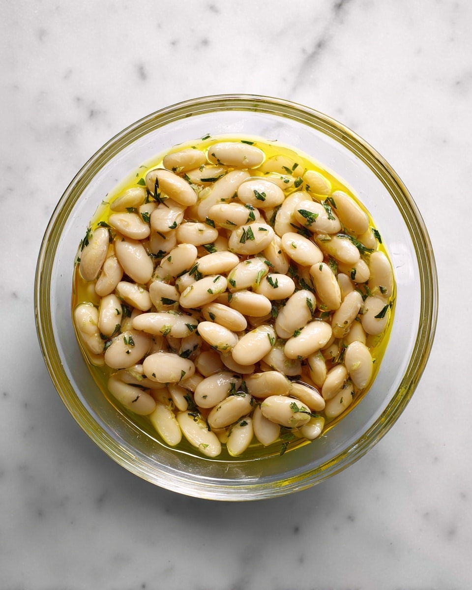 A white plate with two grilled yellow corn ears on the top, showing small black char marks and light seasoning. Below the corn are four long slices of grilled zucchini, each with dark grill lines running diagonally across the green-skinned vegetable. The zucchini slices have a mix of light green and slightly browned areas with visible seasoning spread evenly. The plate sits on a white marbled surface. photo taken with an iphone --ar 4:5 --v 7
