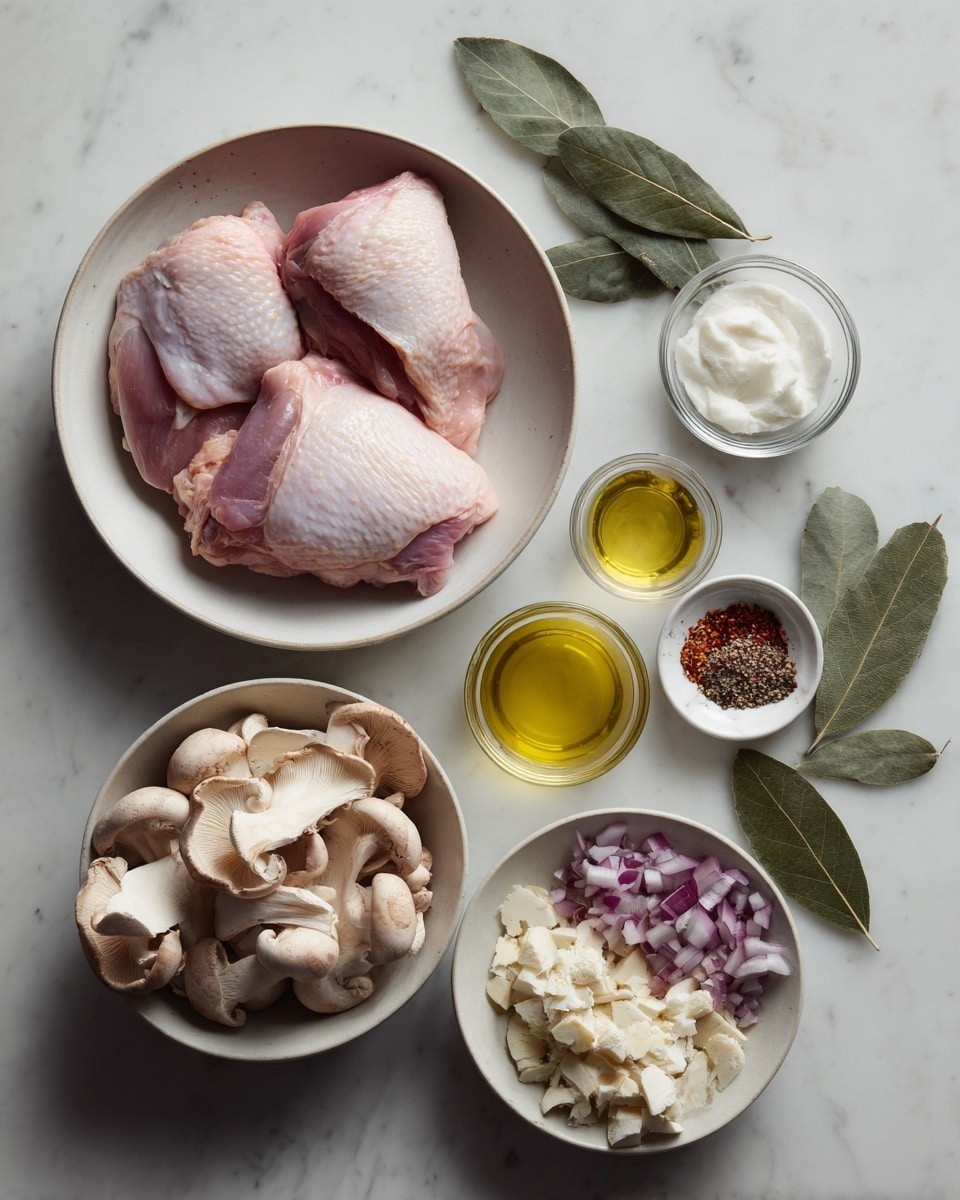 The image shows several white bowls placed on a white marbled surface, each filled with different ingredients. One bowl contains two large light pink raw chicken thighs with smooth texture; another bowl holds a mix of mushrooms with varied shapes and creamy beige to light brown tones, having a soft and somewhat wrinkled texture. Nearby, a smaller bowl is filled with roughly chopped purple onion and white garlic pieces layered on top. There are three small clear glass containers holding different seasonings: one with a golden yellow oil, another with a white granular salt, and the last one with a mix of red and black ground spices. A white bowl with a white creamy substance sits at the top. Two fresh green bay leaves are placed on the marbled surface next to the bowls. photo taken with an iphone --ar 4:5 --v 7