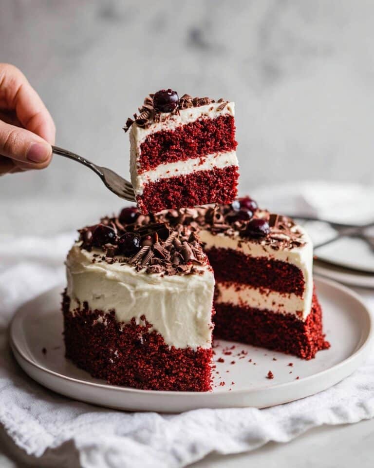 Flourless Red Velvet Cake with Cranberry Garnish and Cream Cheese Whipped Cream Recipe