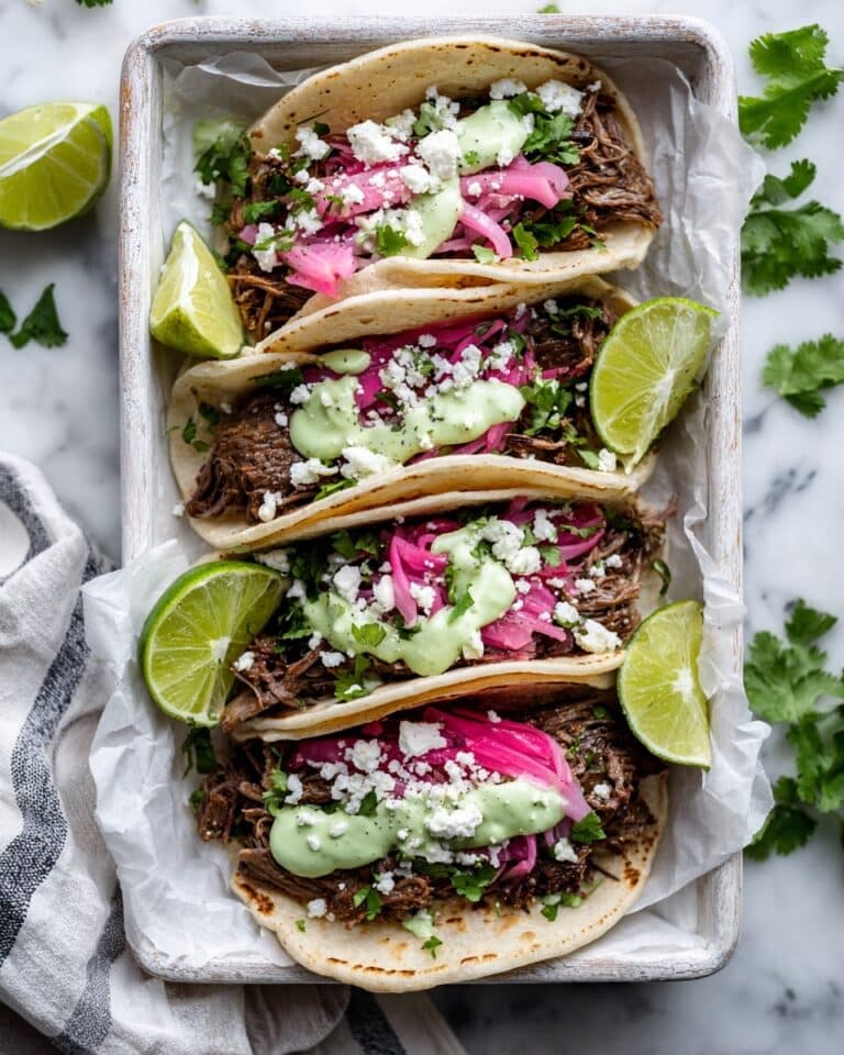 Chuck Roast Tacos with Cilantro Lime Sauce and Pickled Onions Recipe
