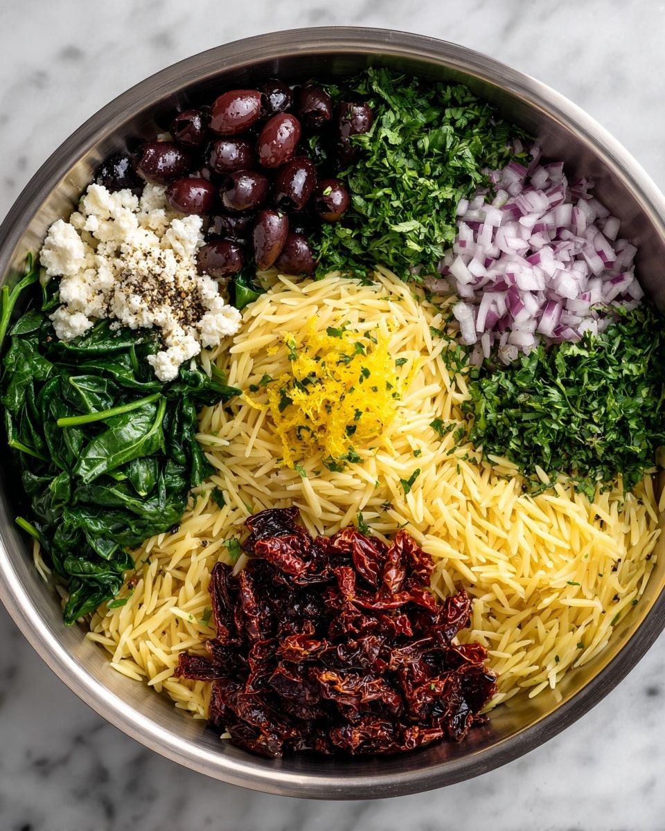 A collection of fresh ingredients is arranged on a white marbled surface, featuring a large black bowl filled with uncooked orzo pasta that is pale yellow and textured, placed to the right center. Around it, there are five smaller white bowls: one filled with glossy dark purple olives, another with crumbled white cheese, a third with dried red sun-dried tomatoes, one with fresh bright green spinach leaves stacked loosely, and the last containing thinly sliced rings of purple-red onion. In the background, there is a clear glass bottle of golden olive oil, two wooden salt and pepper shakers, and three halved yellow lemons showing their juicy, textured insides. A few fresh green mint leaves are laid at the left side, enhancing the overall fresh and natural look of the ingredients. photo taken with an iphone --ar 4:5 --v 7