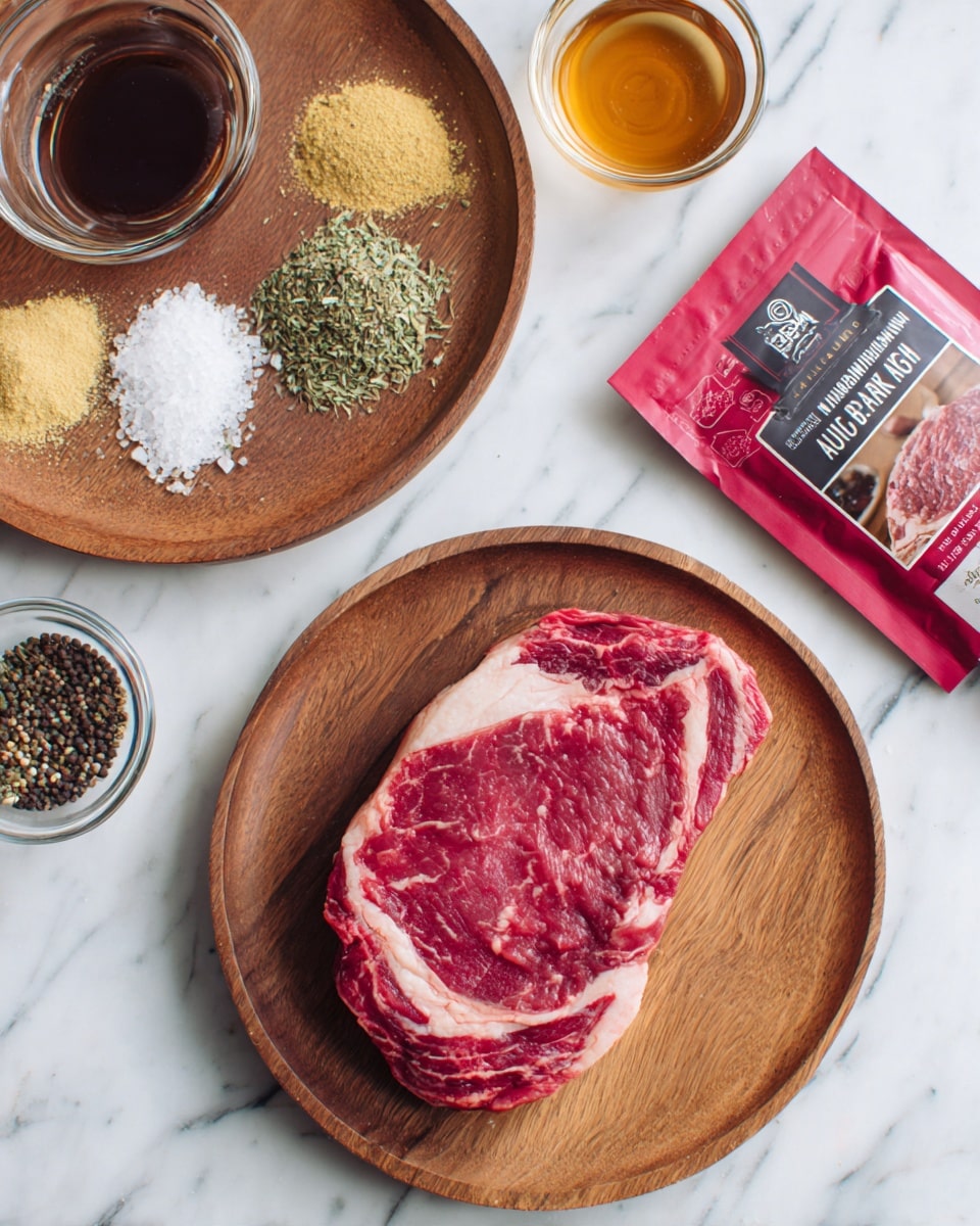 A piece of raw ribeye steak with rich red and white marbled fat placed on a round wooden plate is shown at the bottom right. To the left, a small glass container holds a dark liquid, possibly sauce. In the upper right section, a clear glass bowl contains a golden-brown liquid. To the left of this bowl, a round wooden plate holds five distinct piles of spices and herbs: pale yellow powders, green dried herbs, black pepper, and white salt arranged neatly. Above these, a red and brown seasoning packet with a picture of au jus sauce and meat is laid flat. The background is a white marbled surface. photo taken with an iphone --ar 4:5 --v 7